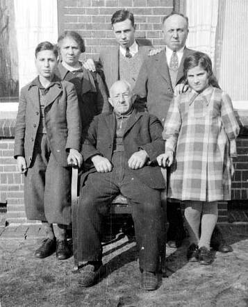 Bernard Gottfriedt, sitting, with the Meijer family, about 1938