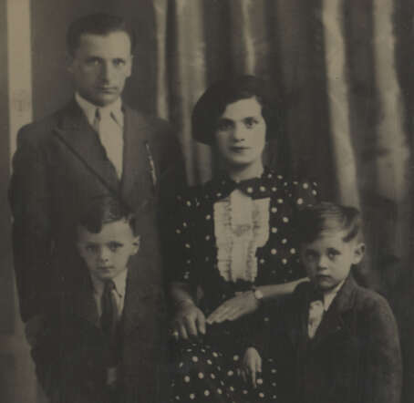 Hijman Joseph and Isaac Joseph Kloos with their father(who survived the war)and their mother Judith Kloos-Verdooner