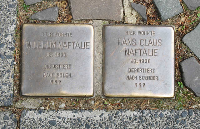 Two stolpersteine for Wilhelm Naftalie and his young son, Hans Claus, in front of Querenburger Straße 24, Bochum, Germany, where they once lived.