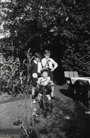 Jacques Peter Lucian Weiler (left) with neigbors