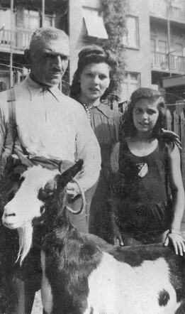 Samuel van Kamerik with a goat