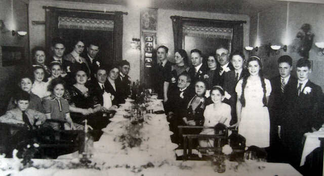Abraham Albert Glaser Glaser (on the left, standing behind the boy with the tie), at the 50th wedding anniversary of his grandparents, oktober 1939