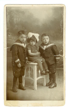 Michel Halberstadt (left) with his brother and sister