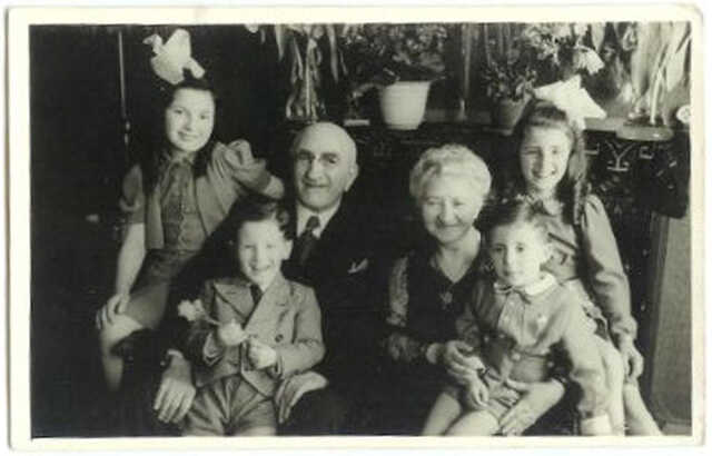 Raymond Meuleman (left, in front) with his sister Mary, grandparent and cousins