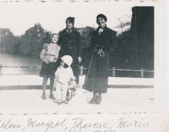 Ellen Sophie (left) and Marguerite (Margrit) Raiss with the cook Thérèse and nanny Maria (the donor of the photo), 1935