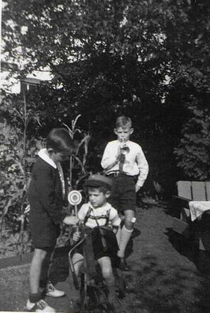 Jacques Peter Lucian Weiler (left) with neighbors