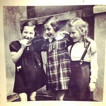 Before the war, playing with cousin Lily and friend. Susi is in the middle.