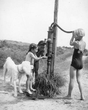 At the water pump in the dunes.