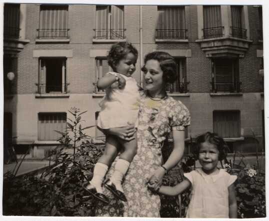 Julie van Weenen poses with her two young cousins Manuela and Jacqueline Mendels outside the girls' Paris apartment aug 1937.