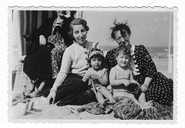 Betty Suzanne Pintus with group on beach.jpeg